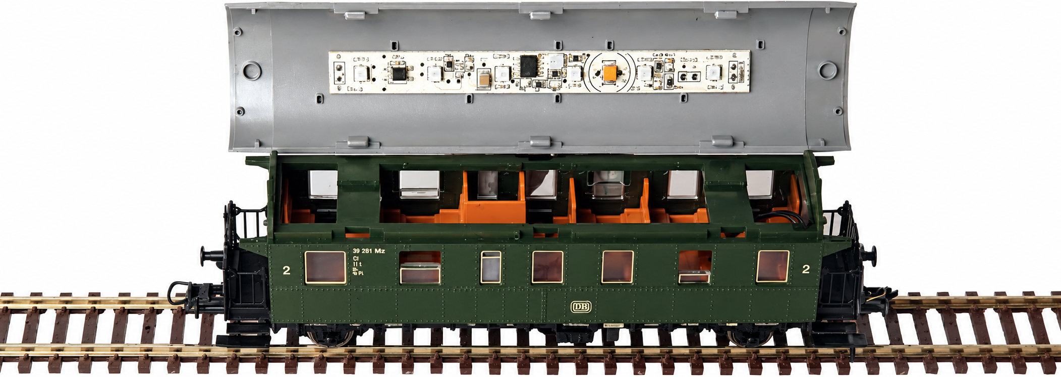 E-Modell coach lighting installed in a Roco Donnerbüchse